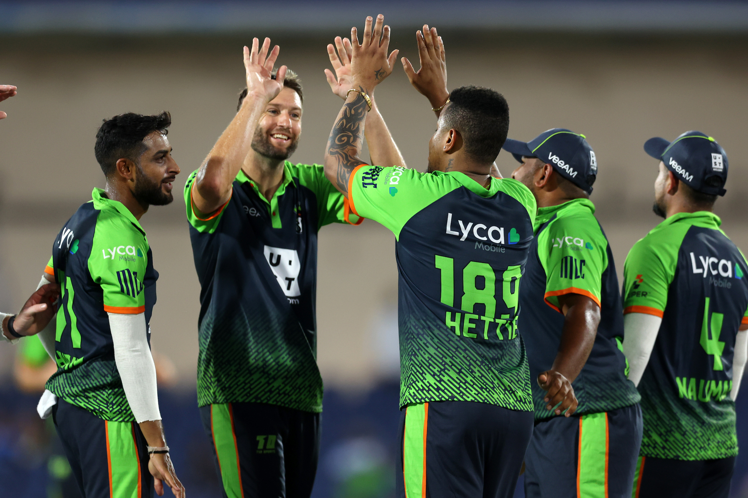 Andrew Tye of the Seattle Orcas celebrates taking the wicket of Moises Henriques of the Washington Freedom (not pictured) with Shimron Hetmeyer of the Seattle Orcas who caught the ball during match three of Major League Cricket season 1 between the Seattle Orcas and Washington Freedom held at the Grand Prairie Stadium, Grand Prairie, TX, United States of America on the 14th July 2023Photo by: Andy Mead/ SPORTZPICS for MLC